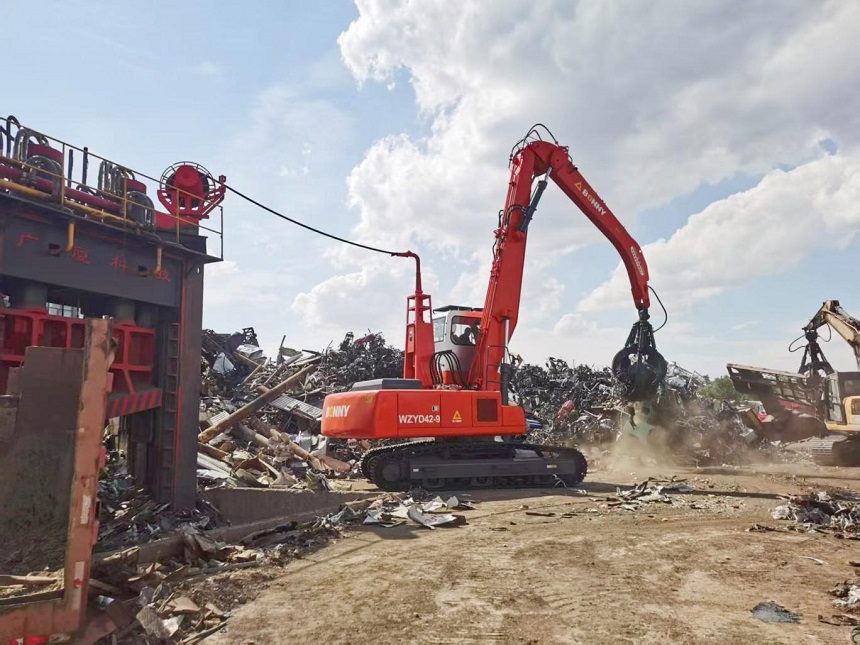 抓料機(jī).jpg 抓料機(jī).jpg